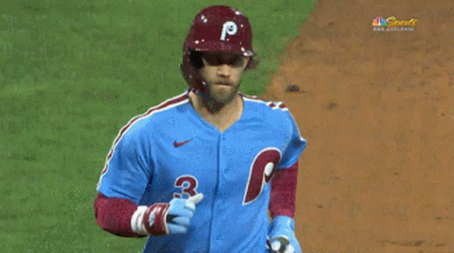 Baseball Player Number 3 Talking to Umpire