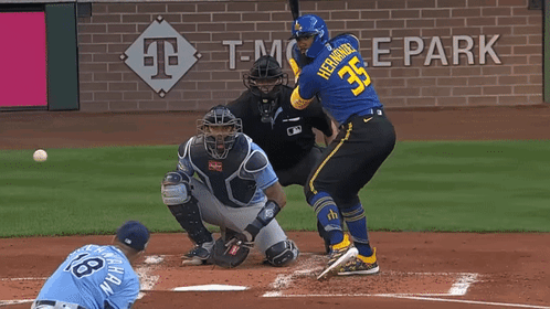 Baseball Player Number 35 About to Hit