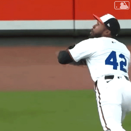Baseball Player Number 42 Throwing Ball