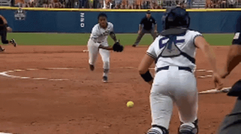 Baseball Player Number 5 Catches Ball