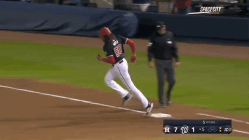 Baseball Player Number 50 Running to Base