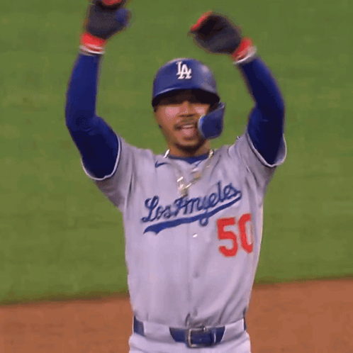 Baseball Player Number 50 Talking to Another Player