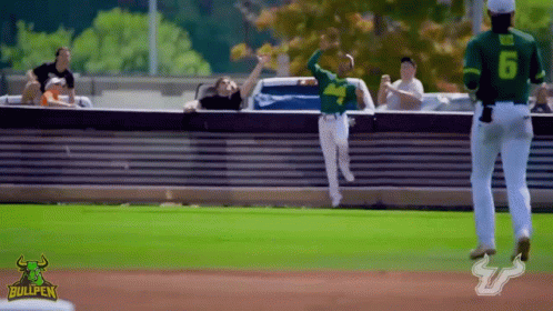 Baseball Player Number 6 Running to Base