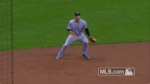 Baseball Player Number 8 Crawling on Field