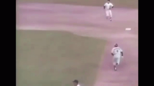 Baseball Player Number 8 Standing on Base