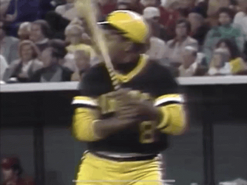 Baseball Player Number 8 Swinging Bat