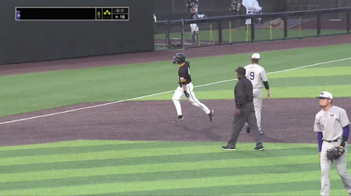 Baseball Player Number 9 Running on Field