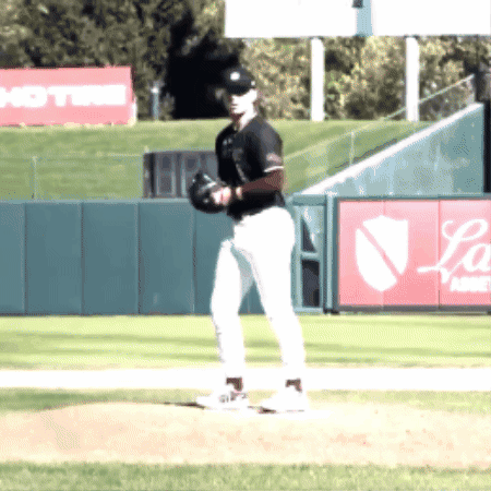 Baseball Player on Mound in Front of LA Sign