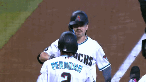 Baseball Player Perdomo Hugging Another Player