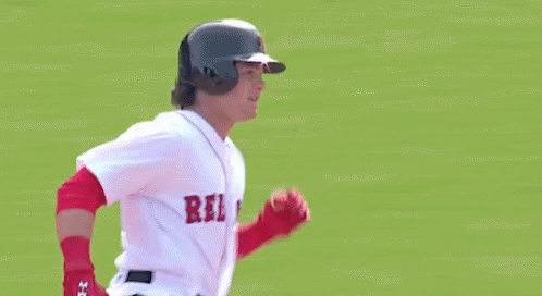 Baseball Player Pointing Up In Helmet And Gloves GIF