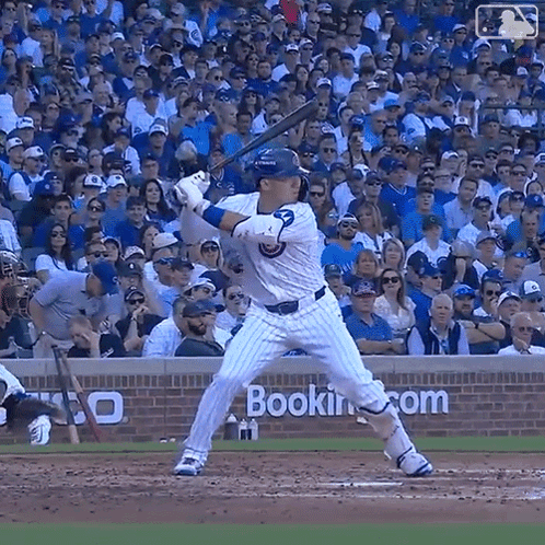 Baseball Player Ready to Swing Before Bookin.com Sign