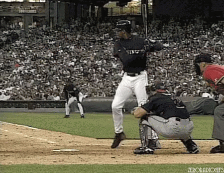 Baseball Player Ready To Swing, Catcher Watches GIF