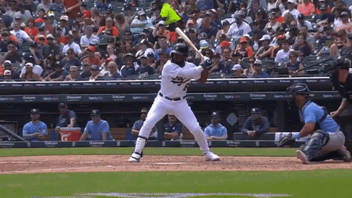 Baseball Player Ready to Swing with Tigers Sign