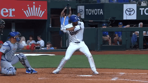 Baseball Player Ready to Swing with Toyota Sign