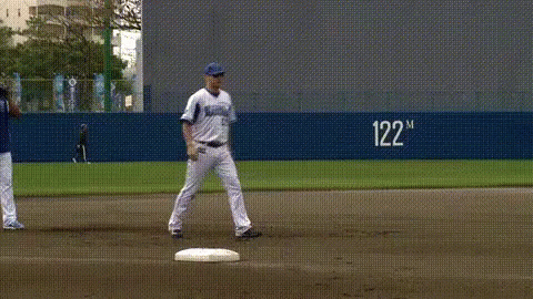 Baseball Player Ready to Throw Ball at 122m
