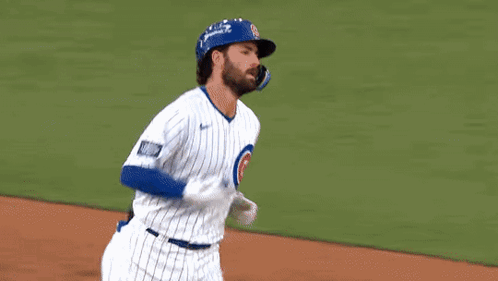 Baseball Player Running in Blue Hat