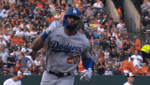 Baseball Player Running in Dodgers Jersey