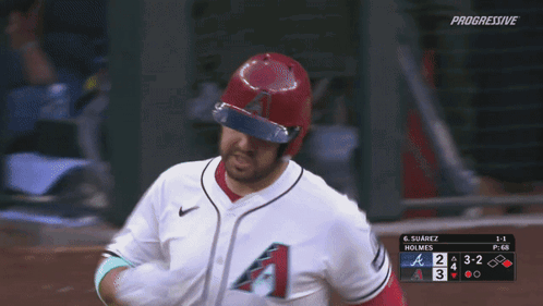Baseball Player Running in White Jersey With A