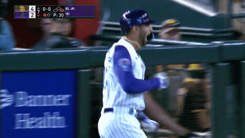 Baseball Player Running Past Health Sign Banner GIF
