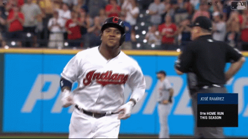 Baseball Player Running Towards Home Plate