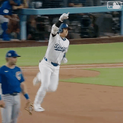 Baseball Player Running Towards Home