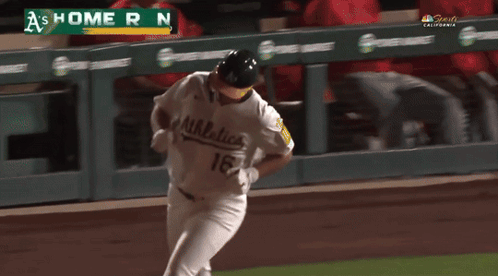 Baseball Player Running With Home Run Sign