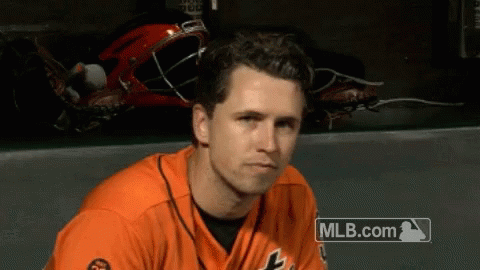 Baseball Player Sitting In Dugout GIF