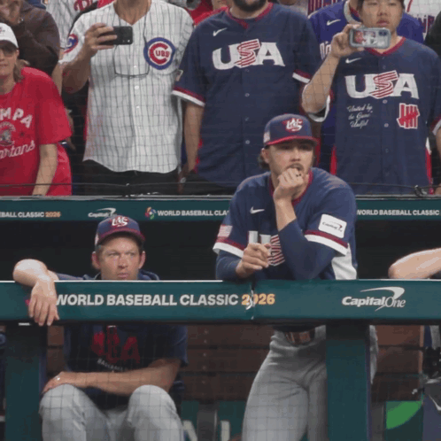 Baseball Player Sitting in Dugout