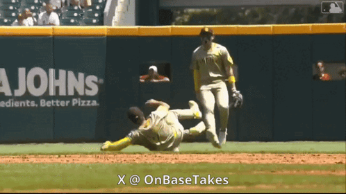 Baseball Player Sliding Into Base