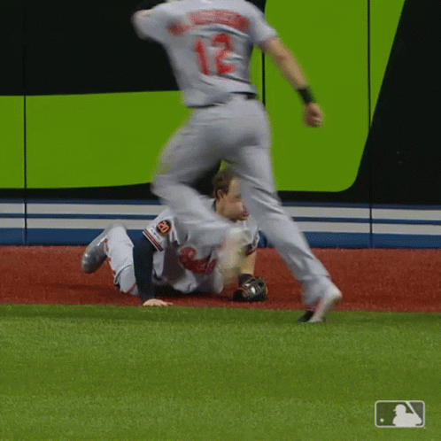Baseball Player Sliding Into Base