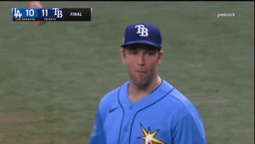 Baseball Player Smiling in B Hat