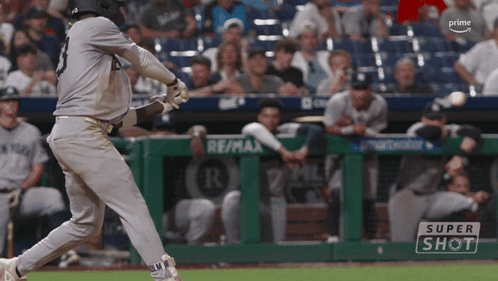 Baseball Player Swinging At Ball Saying Super Shot GIF