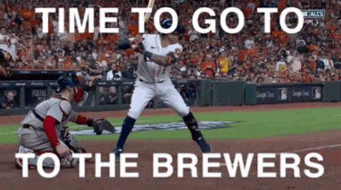 Baseball Player Swinging at Ball Time to Go to Brewers