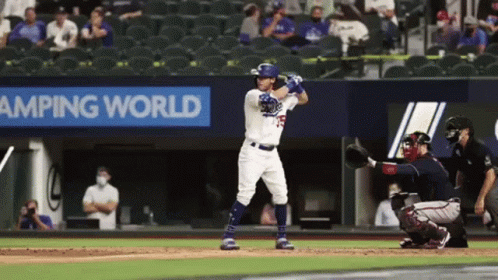 Baseball Player Swinging at Pitch
