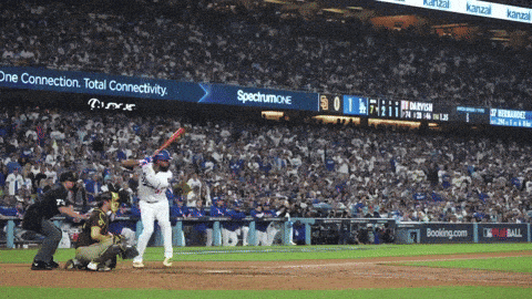 Baseball Player Swinging at Pitch