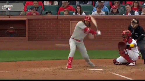 Baseball Player Swinging at Pitch Catcher Watching