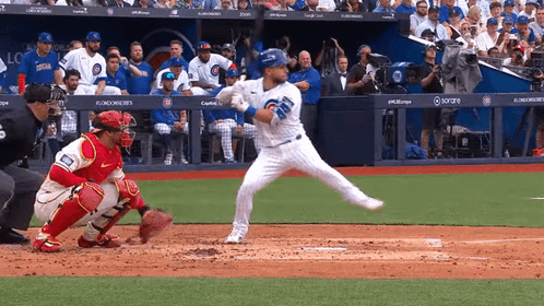 Baseball Player Swinging at Pitch