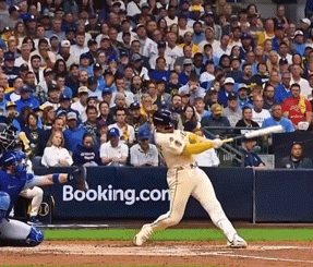 Baseball Player Swinging at Pitch