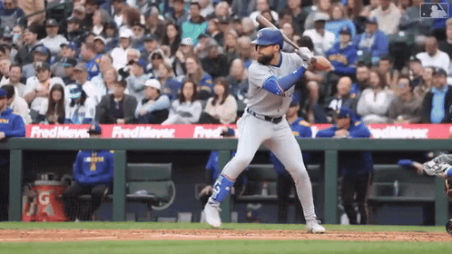Baseball Player Swinging at Pitch Sponsored by Fred Meyer