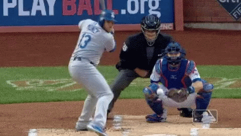 Baseball Player Swinging at Pitch
