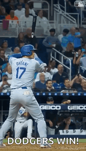 Baseball Player Swinging Bat