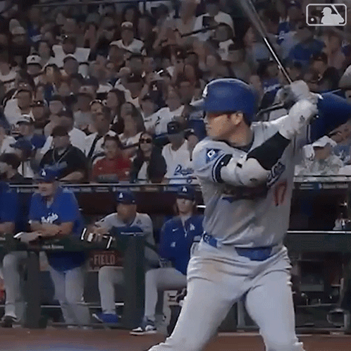 Baseball Player Swinging Bat at Ball