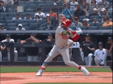 Baseball Player Swinging Bat Cardinals Jersey