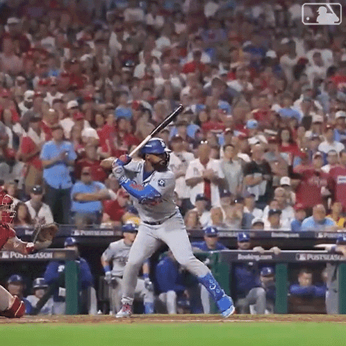 Baseball Player Swinging Bat