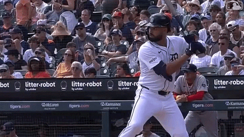 Baseball Player Swinging Bat