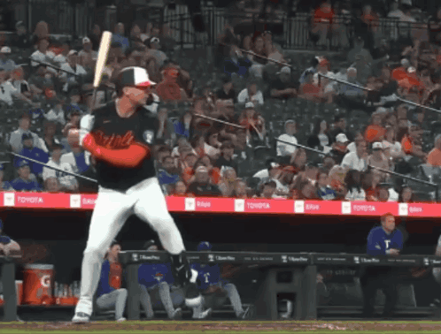 Baseball Player Swinging Bat In Front Of True Banner GIF