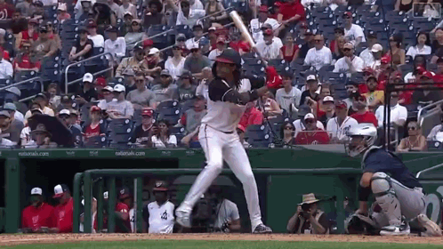 Baseball Player Swinging Bat