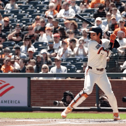 Baseball Player Swinging Bat