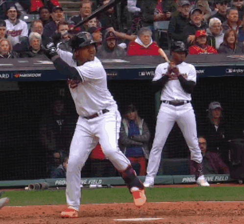 Baseball Player Swinging Bat