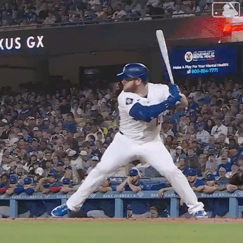 Baseball Player Swinging Bat